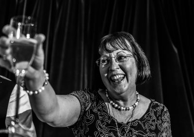 Woman toasting at a speech